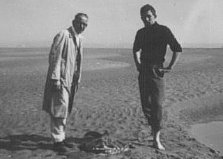 Photo from Charlie Harper showing him and his father (who was then head chef at the Marine Hotel) with a monk fish  found in a pool on the beach in the summer of 1962. Its vital statistics were: length 4 ft 4 inches, head 22 inches across.